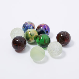 9 large marbles in the Magic Forest Shooters collection from Billes & Co | © Conscious Craft