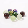 9 large marbles in the Magic Forest Shooters collection from Billes & Co | © Conscious Craft