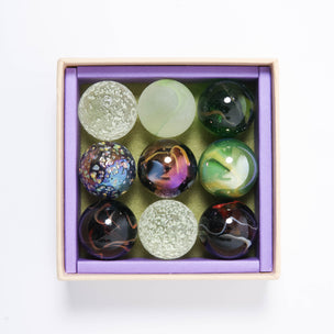 9 large marbles in the Magic Forest Shooters collection from Billes & Co | © Conscious Craft