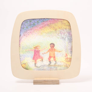 Children's picture frame with a colorful illustration of two children playing outdoors.