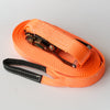 Orange Slackline with a ratchet mechanism on a light grey background
