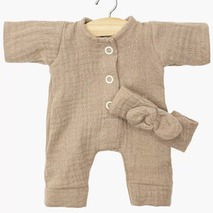 Beige Minikane romper with matching hat on a hanger against a white background