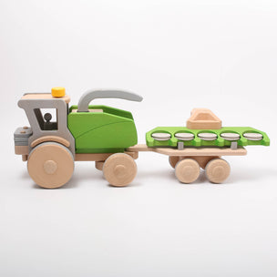 Dynamiko wooden Trailer with Combine Harvester & ballast | Image © Conscious Craft