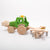 Dynamiko green wooden Tractor with rotary rake and bucket | Image © Conscious Craft