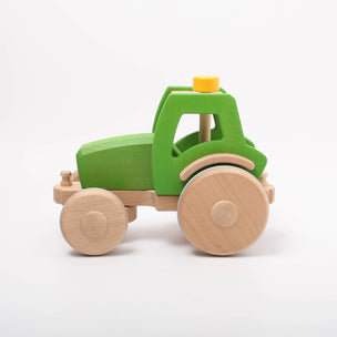 Dynamiko green wooden Tractor | Image © Conscious Craft