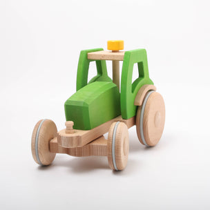 Dynamiko green wooden Tractor | Image © Conscious Craft