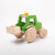 Dynamiko wooden bucket on green tractor | Image © Conscious Craft