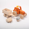 Dynamiko wooden orange tractor with trailer, bucket and ballst | Image © Conscious Craft