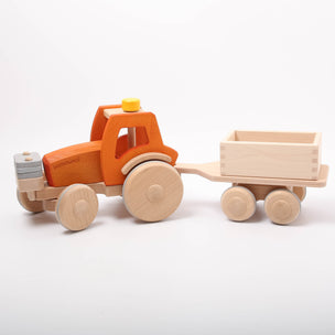Dynamiko wooden orange tractor with trailer and ballst | Image © Conscious Craft