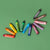 A set of crayons in multiple colors arranged in two curved rows on a solid green background. The crayons have the brand name 'HoyEysSticks' printed on them.