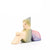 Eric & Albert wooden toy fairy in green sitting on the ground with pinky purple wings | © Conscious Craft