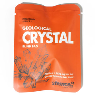 Orange packaging of 'Geological Crystal' blind bag with crystal graphics and text on a white background
