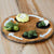 Felt turtle toy on a wooden surface
