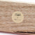 Wooden product with a 'once a tree' and 'taratreasures' label.