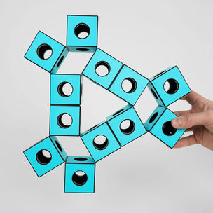 TECTI construction toy | each cubotic design seamlessly transforms into diverse shapes through the ingenious, patented built-in hinges.