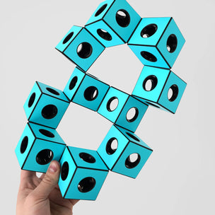 TECTI construction toy | each cubotic design seamlessly transforms into diverse shapes through the ingenious, patented built-in hinges.