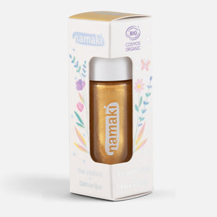 Namaki Cosmos Organic Glow Gel in a white box with a clear window showing the gold glitter gel inside, set against a light gray background.