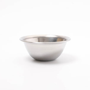 Stainless steel mixing bowl on a white background