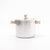 Stainless steel pot with wooden handles on a white background