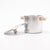 Silver pot with wooden handles on a white background