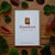 Hawthorn brand card on a wooden surface with leaves