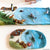 Felt play mat with ocean-themed animals and landscape on a light surface.