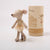 Maileg mouse doll in a tutu next to a packaging on a white background