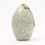 Maileg Easter Egg-shaped container with a tropical leaf pattern on a white background
