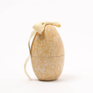 Maileg Easter Egg Small, Cream Yellow with bow on the top | Image © Conscious Craft