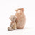 Small Maileg lamb toy with a decorative pink egg-shaped container on a white background