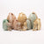 Decorative Maileg Easter egg-shaped boxes with plush toys on a white background