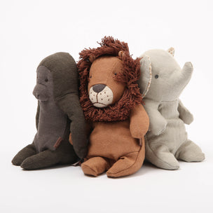 Three Maileg plush toys, including a lion, a gorilla and a elephant, on a white background