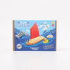 Toy boat set packaging with a sailboat illustration on a blue background