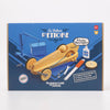 Box for a wooden toy car kit with tools and glue, featuring branding and product details.