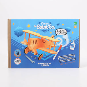 Box for a wooden airplane kit with branding and text on a blue background