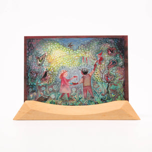 Colorful artwork of children playing in a garden with a wooden base