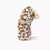 Minikane Baby bottle with a floral pattern and a matching bib on a white background