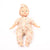 Baby doll wearing a floral outfit and headband on a white background