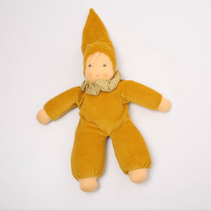Yellow waldorf doll on white background