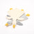 Plush toy shaped like a duck with a soft texture on a white background