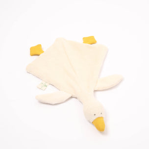 Plush toy shaped like a duck with a yellow beak on a white background
