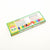 Box of colorful wax crayons with branding on a white background