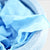 Close-up of blue fabric with a textured surface