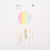 Packaging of rainbow-colored wax sheets with a white background