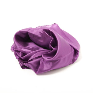 Purple satin fabric on a white background