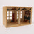 Wooden dollhouse with decorated interior on a white background