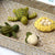 Set of felted turtle toys on a woven surface