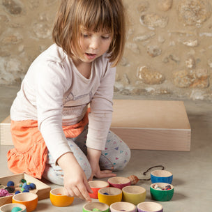 Girl Playing 12 Rainbow Bowls By Grapat | Conscious Craft