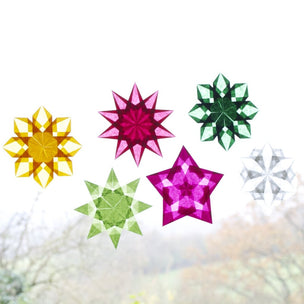 Window stars made using Kite Paper squares | © Conscious Craft