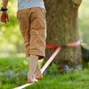 A child balancing on a slackline | © Conscious Craft 